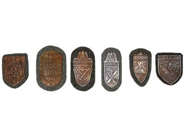 GROUP OF SIX GERMAN WWII MODEL SHIELDS