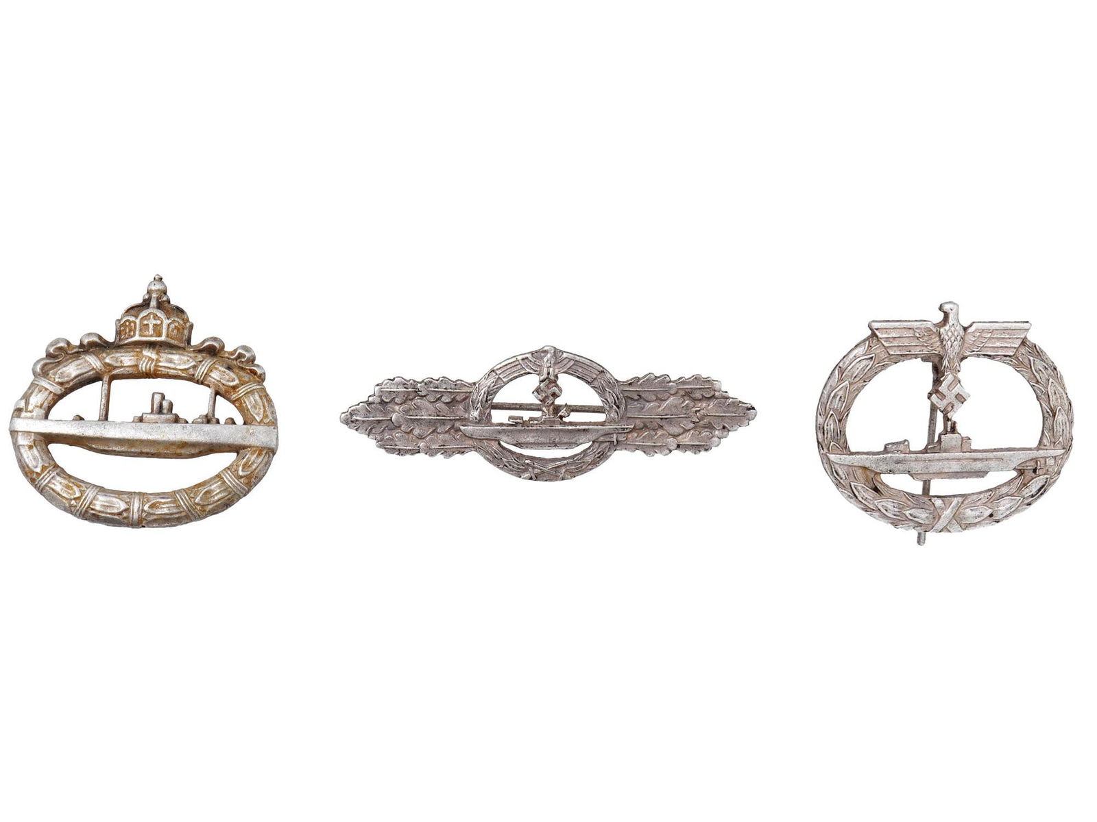 GROUP OF THREE GERMAN WWII  MODEL U BOAT BADGES (1 of 3)