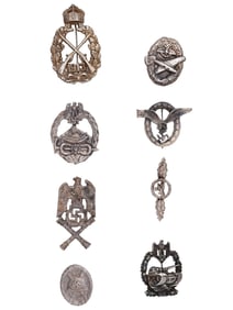 GROUP OF EIGHT GERMAN WWII MODEL BADGES