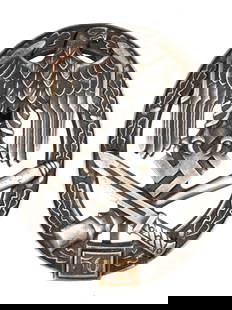 WWII NAZI GERMAN ARMY GENERAL BADGE 50 ASSAULTS: A WWII Nazi German Army General Assault badge, given for 50 assaults. Features a wreath of five oak leaves runs around the circumference on each side of the medal with a pair of acorns at the base. In