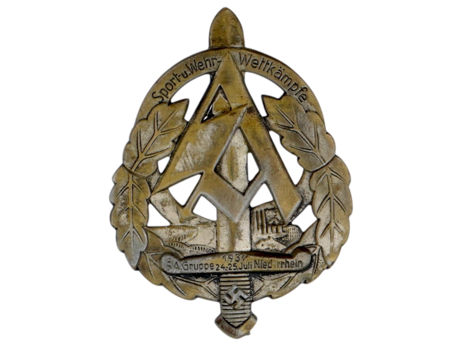 WWII NAZI SA STURMABTEILUNG GRUPPE 1937 SWORD PIN BADGE: A WWII German Nazi SA Sturmabteilung gruppe shield shaped sports pin badge. The badge is made from a silver toned metal and features a large, stylized A symbol with a sword across its center. It is su