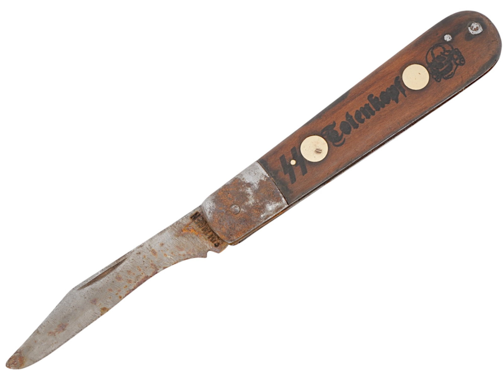 GERMAN WWII MODEL WAFFEN SS DIVISION TOTENKOPF POCKET KNIFE: A World War II Nazi German model stainless steel pocket knife with a wooden handle. The handle is etched with SS Totenkopf and skull insignias. Marked, Solingen, on a ricasso. Historical Collectables,