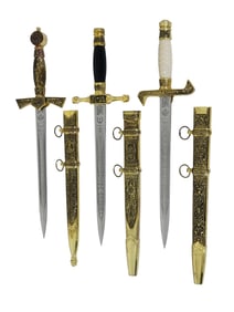 GROUP OF THREE RUSSIAN DAGGERS WITH SCABBARDS