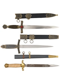 GROUP OF THREE RUSSIAN DAGGERS WITH SCABBARDS