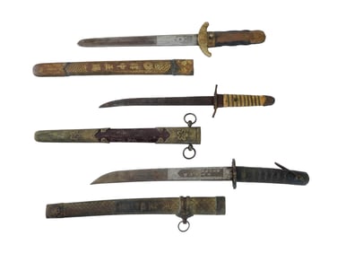GROUP OF THREE ASIAN DAGGERS WITH SCABBARDS