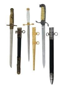 GROUP OF THREE INTERNATIONAL DAGGERS WITH SCABBARDS