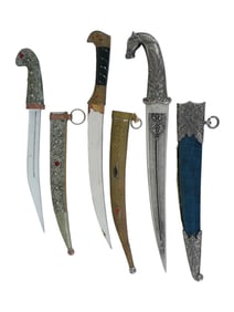 GROUP OF THREE INDIAN STYLE DAGGERS WITH SCABBARDS