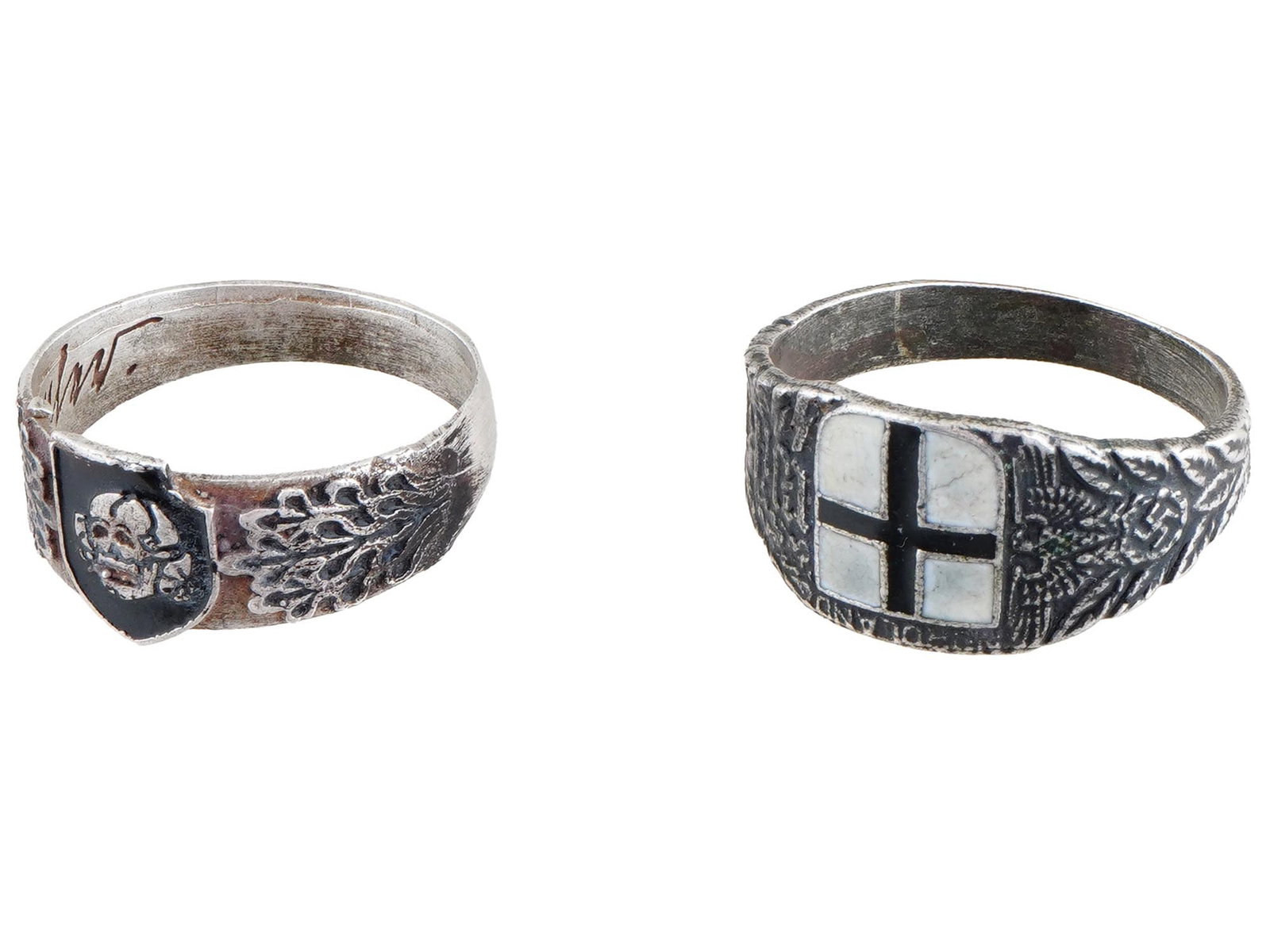 LOT OF TWO GERMAN WWII TYPE WAFFEN SS SILVER RINGS: A lot of two WWII type German Waffen SS silver rings: Waffen SS division Totenkopf ring and Waffen SS division Wiking regiment Nordland enameled silver signet ring. The exterior of the Totenkopf ring 