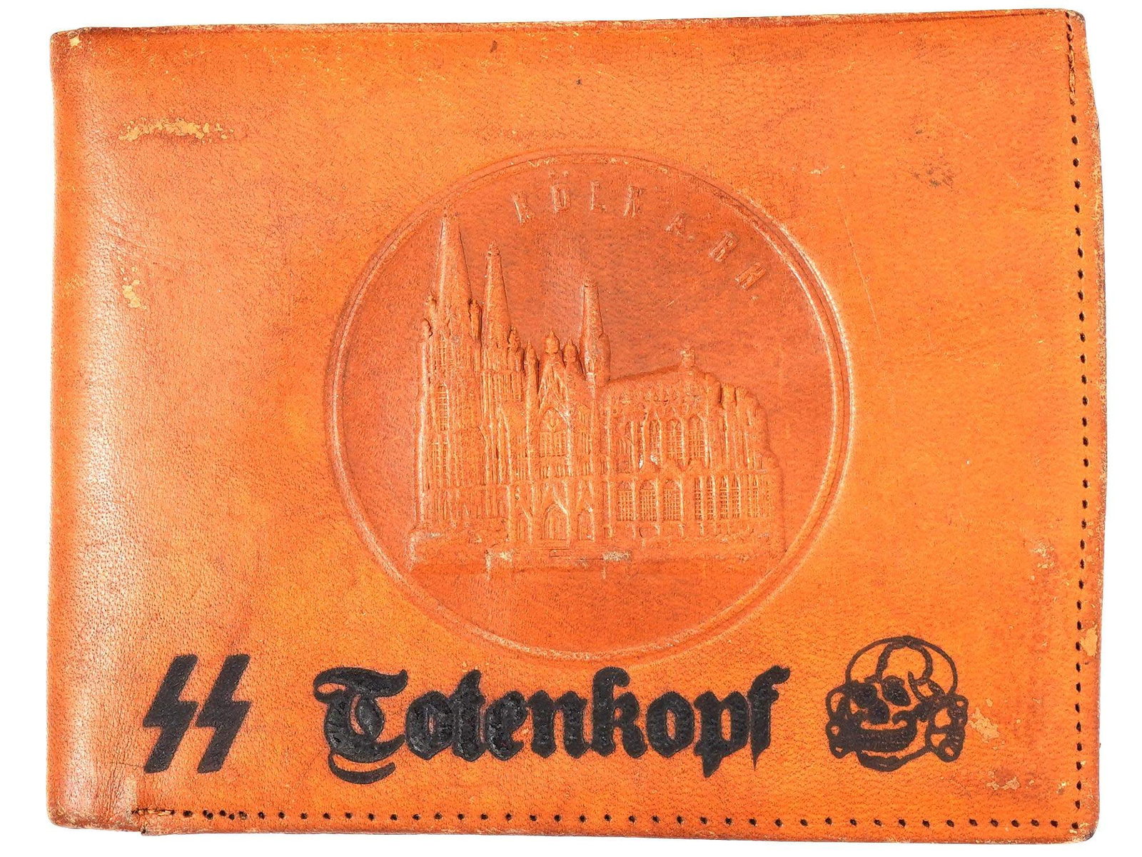 WWII TYPE GERMAN NAZI SS LEATHER WALLET: A WWII type German Nazi SS leather wallet. The front side of the wallet features an embossed of a cathedral, alongside the words SS Totenkopf and a skull emblem. The reverse side of the wallet is ador