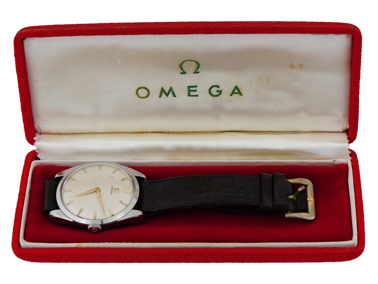 VINTAGE OMEGA STAINLESS STEEL MANUAL WIND WRISTWATCH: A vintage Omega stainless steel manual wind wristwatch featuring a silvered honeycomb dial with applied faceted bullet hour markers, black outer minute divisions, and polished lance hands with center 