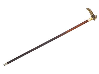 RUSSIAN SILVER ENAMEL WITH DIAMONDS WALKING CANE: A Russian walking cane features a wooden shaft and a gilt silver textured handle, adorned with a gilt Imperial eagle. The eagle is set against a turquoise guilloche enamel decorated with gemstones and