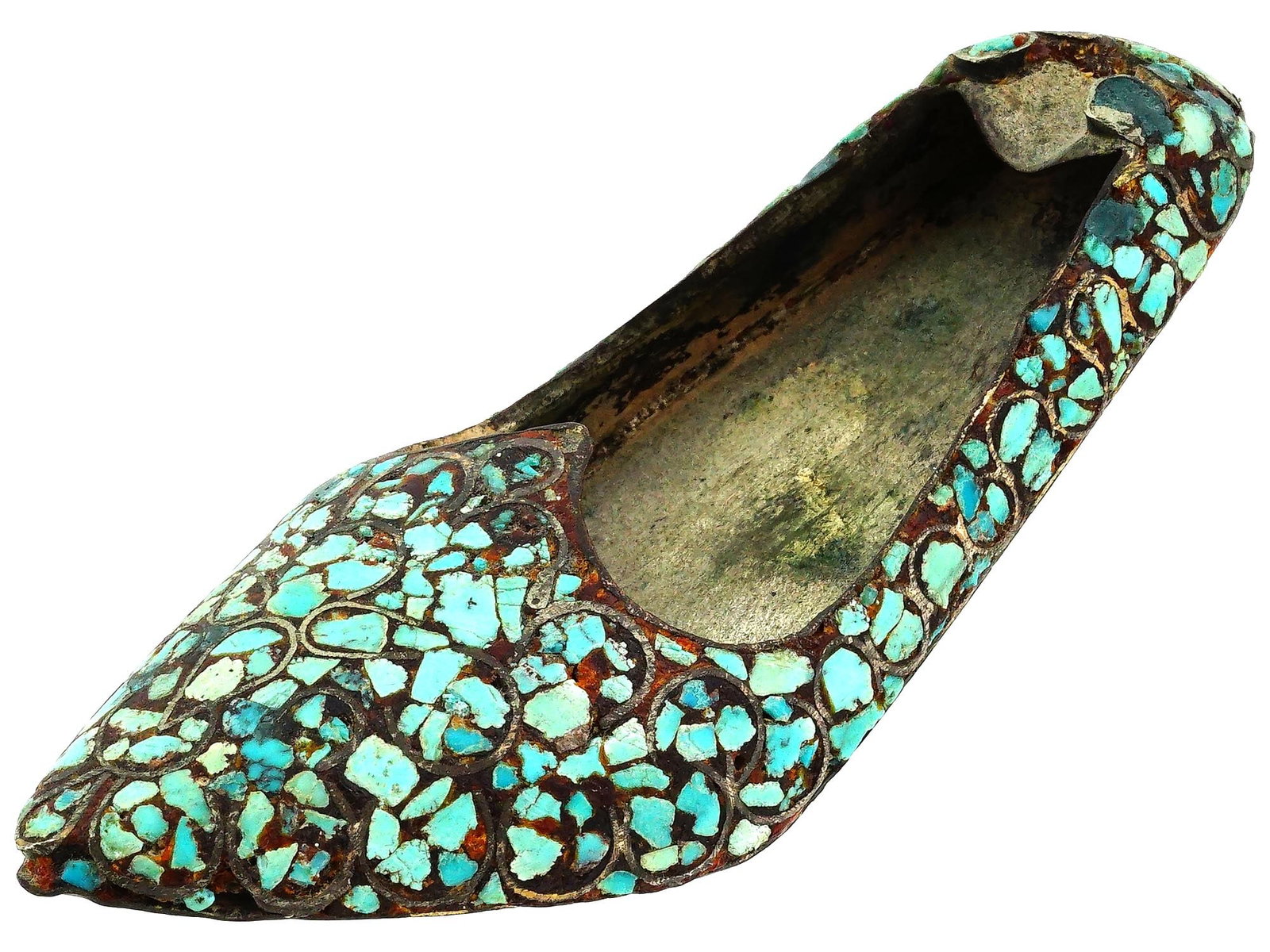 ORIENTAL MANNER TURQUOISE STONES SCULPTURAL SHOE: An Oriental manner sculptural metal shoe. The shoe is made in a curved design, decorated with a scrollwork ornament with gilded accents, and inlaid with Turquoise stones. Antique and Vintage Asian and
