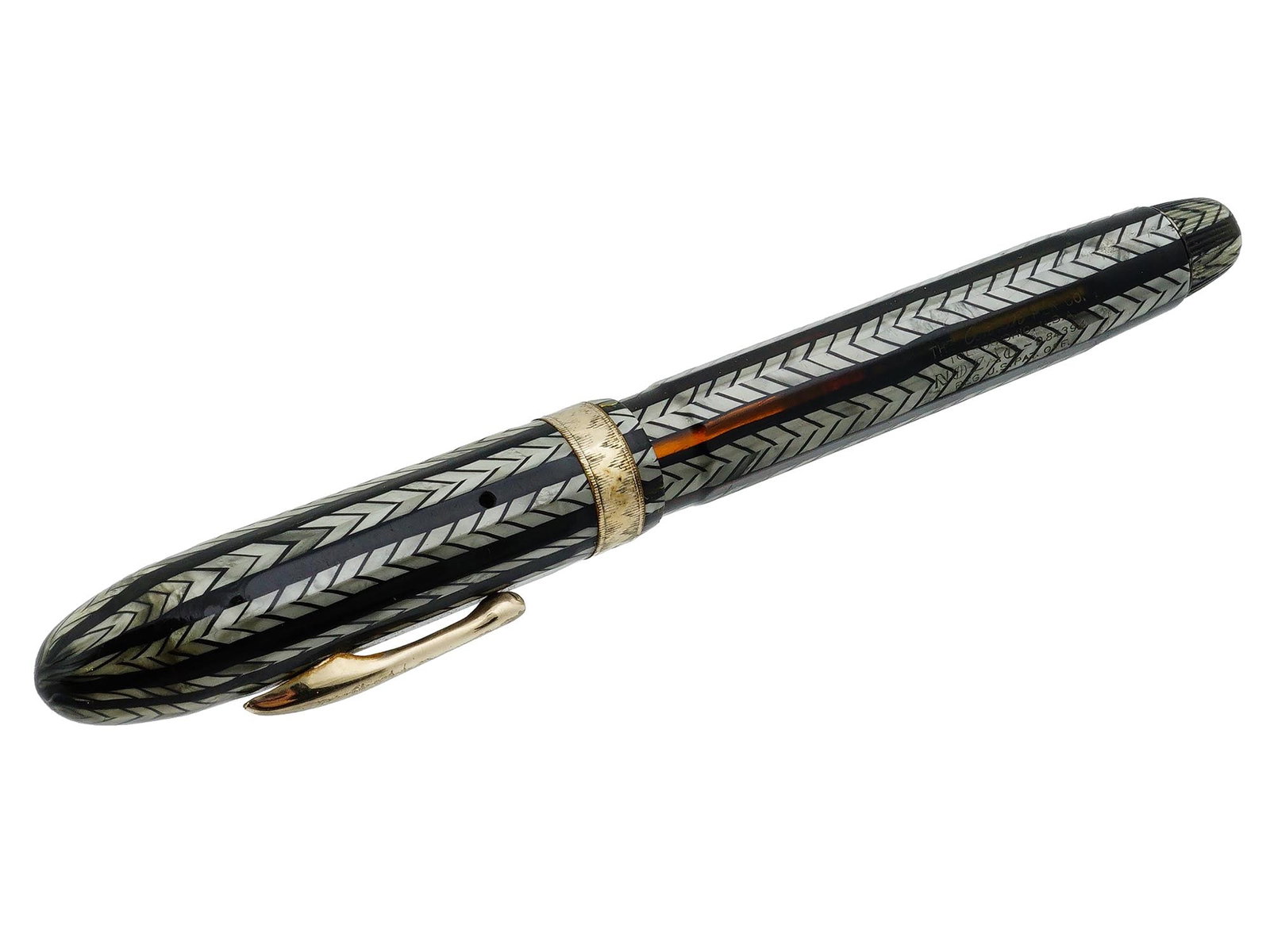CONKLIN TOLEDO NOZAC HERRINGBONE DESIGN FOUNTAIN PEN: A vintage fountain pen by Conklin Pen Co., Ohio. The pen is made in a Nozac V line design in a herringbone pattern with golden details and nib. Hallmark Conklin Toledo is on the nib. Hallmark Conklin 