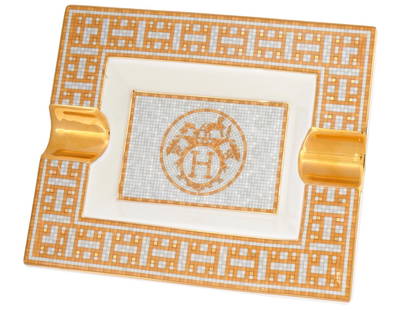 HERMES MOSAIQUE AU 24 COLLECTION PORCELAIN ASHTRAY: A vintage French porcelain ashtray by Hermes from the Mosaique au 24 collection designed by Benoit Pierre Emery. Rectangular piece with two cigarette grooves and transfer printed Mosaique au 24 gold t