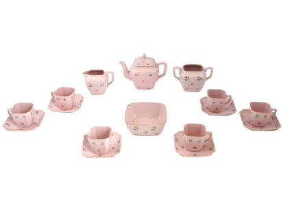 1940S RUSSIAN SOVIET ERA PINK PORCELAIN TEA SERVICE: A Russian Soviet era porcelain tea service. Ca. 1940s. A total of 16 items, including a teapot, a sugar bowl, a creamer, 6 tea pairs, and a serving plate. Square-shaped pieces with beveled corners. Pi