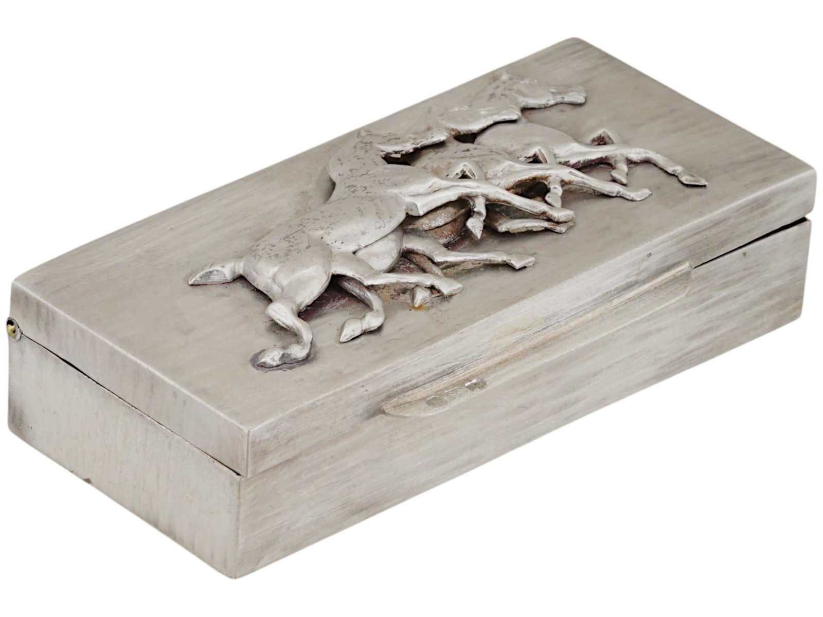 RUSSIAN 84 SILVER SNUFF OR PILL BOX W HINGED LID: A Russian 84 silver snuff or pill box. The rectangular box with a hinged lid is decorated with a figural image of three horses running one after another. Marked with 84 silver standard and manufacture