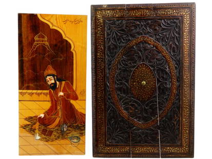 ISLAMIC PAINTING AND INDIAN BRASS WOOD WALL PANEL: A lot of two Islamic artworks, including a Persian painting and an Indian wall panel. The painting, painted on a wood board and varnished, depicts a man sitting on the floor reading. The Indian gilt b