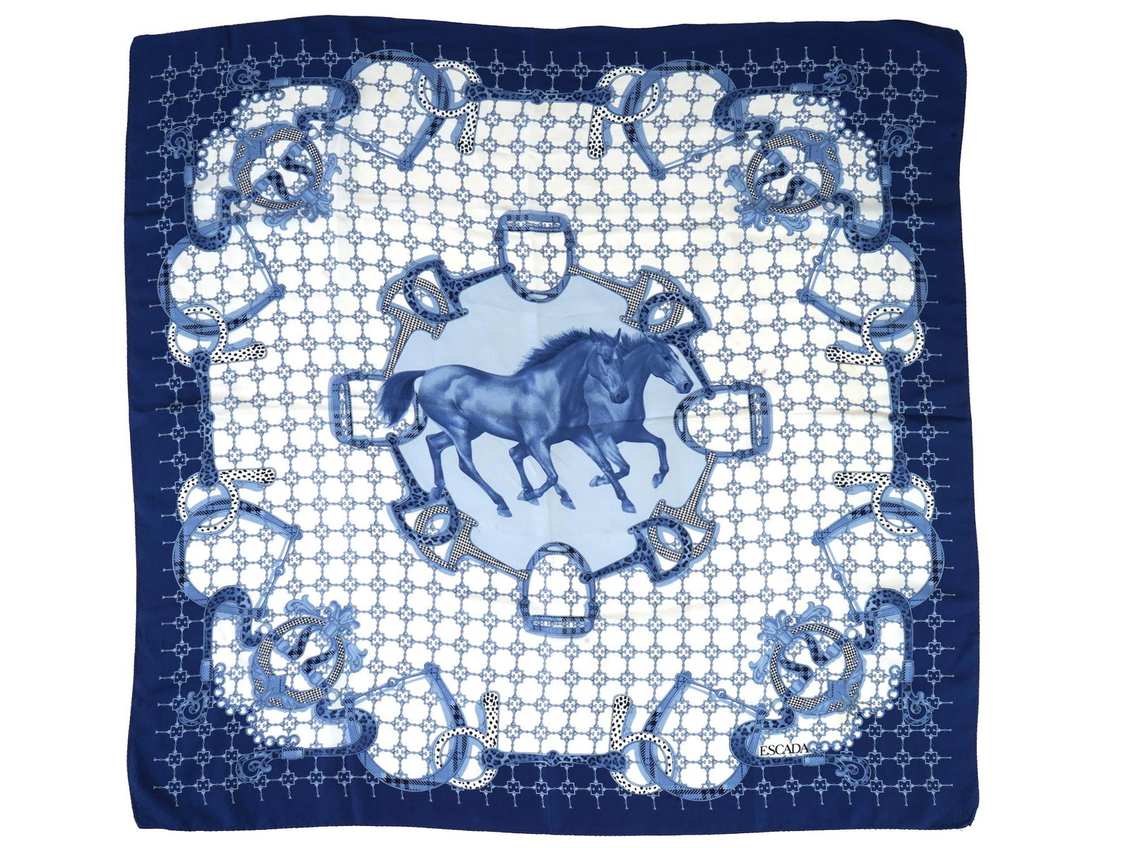 GERMAN EQUESTRIAN LADIES SILK SCARF BY ESCADA: A vintage German equestrian themed ladies silk scarf by Escada. The blue and white scarf features two running horses in the center, surrounded by stirrups and horseshoes against a geometric background