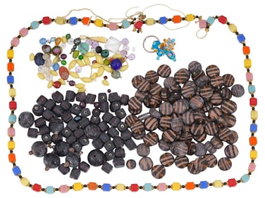 COLLECTION OF CARVED STONE BEADS AND NECKLACE