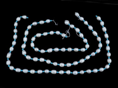 THREE STRINGS OF NATURAL PEARLS WITH TURQUOISE BEADS