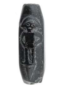 ANCIENT CYLINDER SEAL CARVED FROM BLACK STONE