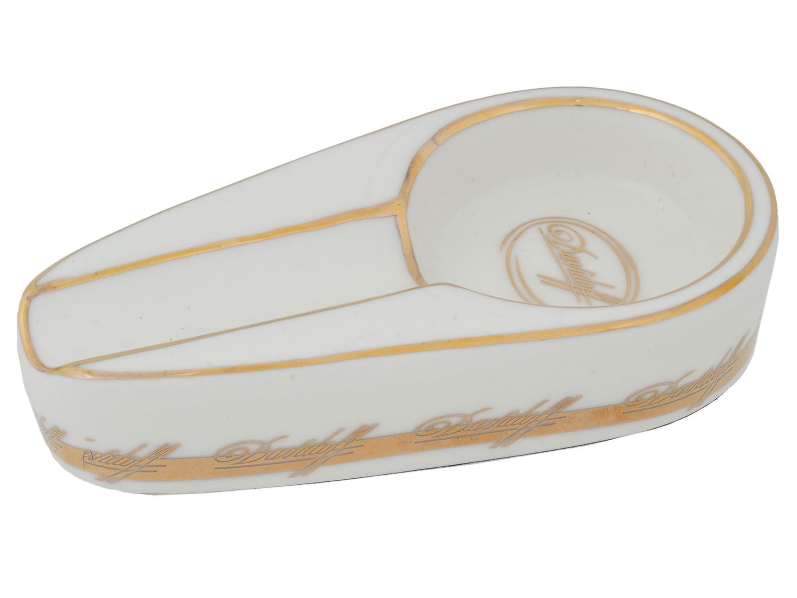 VINTAGE DAVIDOFF CERAMIC CIGAR ASHTRAY: A vintage ceramic single caliber cigar ashtray by Davidoff. Features a gold colored decor on a white ground with Davidoff logo on the center and around the sides. Vintage Ashtrays And Tobacciana Colle