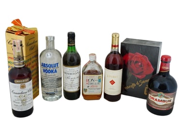 COLLECTION OF ALCOHOL DRINKS IN VINTAGE BOTTLES