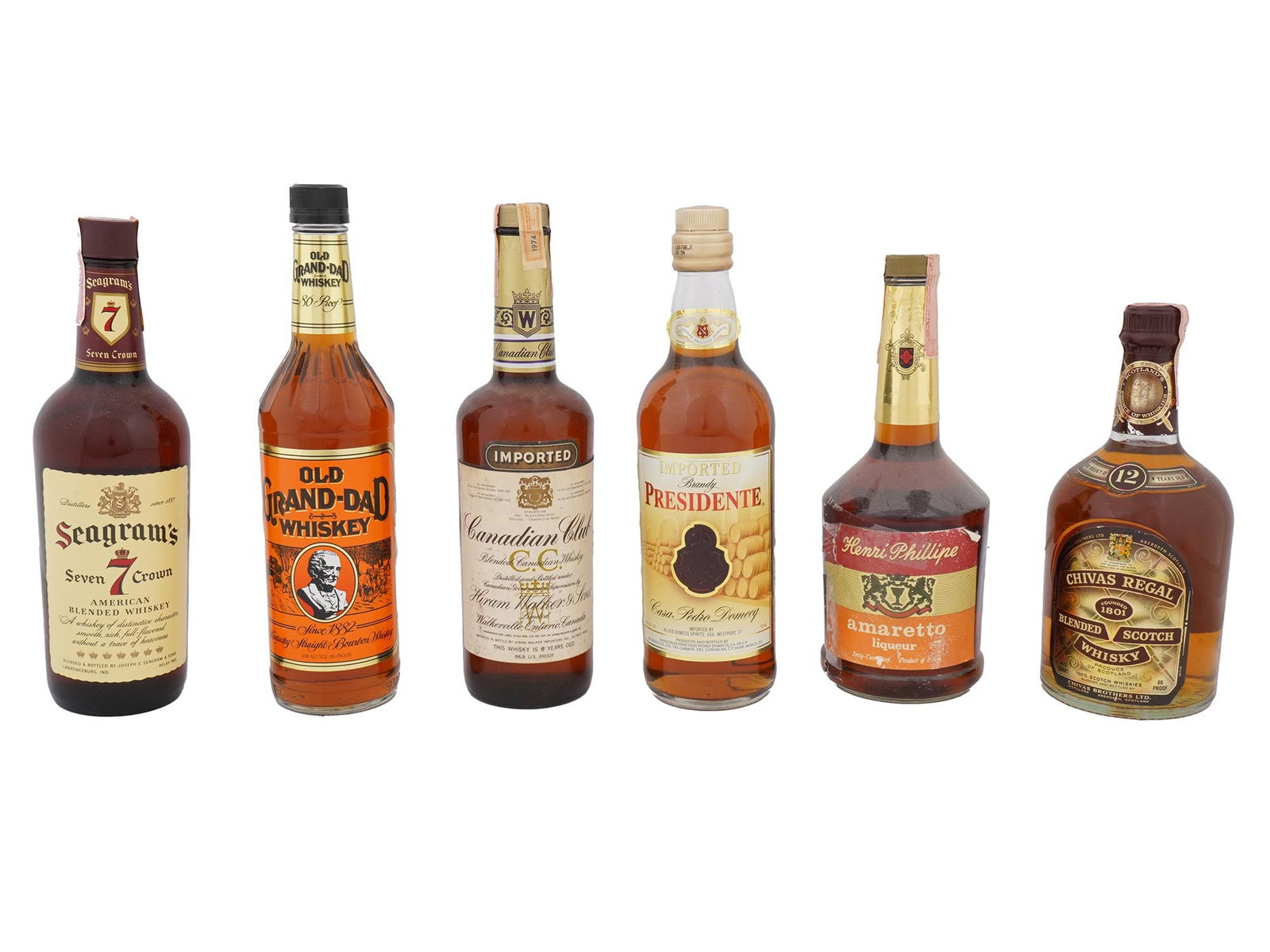 VTG BOTTLES OF ALCOHOLIC DRINKS FROM RENOWNED BRANDS: A collection of bottles with alcoholic beverages from renowned brands, offering a diverse variety of whiskey, bourbon, brandy, and liqueur from renowned distilleries across North America and Europe, i