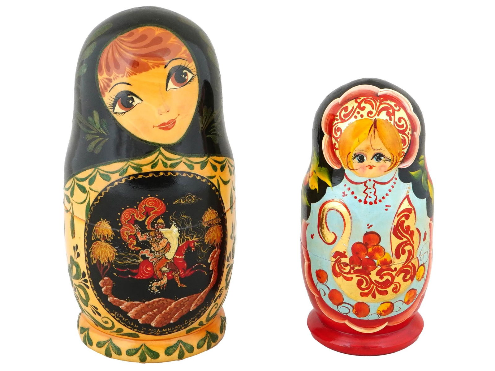 RUSSIAN MATRYOSHKA PAINTED LACQUERED WOODEN DOLL SETS: A lot of two vintage Russian Matryoshka hand painted and lacquered wooden doll sets. The first set contains 7 nesting dolls. The second set contains 5. All the dolls are hand painted with motifs from
