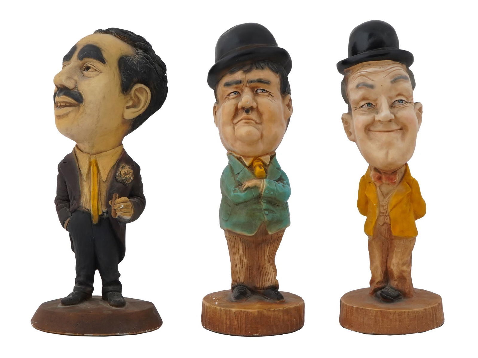 LOT OF 3 COMEDY ACTOR FIGURINES: This lot of 3 figurines features classic comedy legends and is perfect for collectors of vintage entertainment memorabilia. Included in the lot is a detailed Groucho Marx figurine, capturing his signa