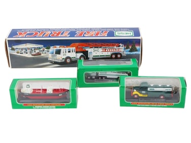 LOT OF 4 HESS TRUCK COLLECTIBLE TOYS
