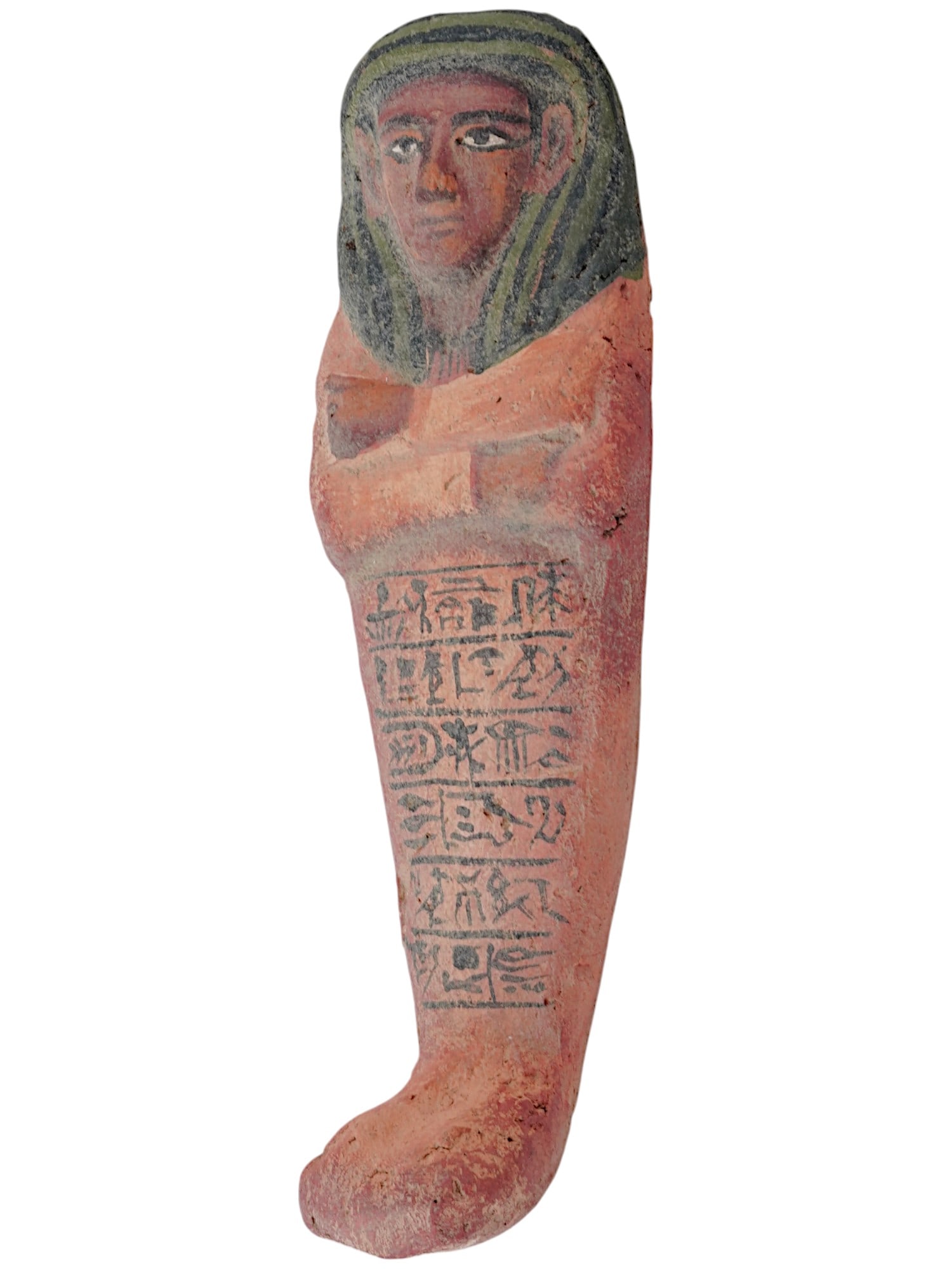 ANCIENT EGYPTIAN TERRACOTTA USHABTI BURIAL FIGURINE: An ancient Egyptian hand painted terracotta ushabti burial sculpture, circa 1570 to 1342 BC. The sculpture depicts a figure standing in mummiform. A column of black painted hieroglyphic symbols is pre