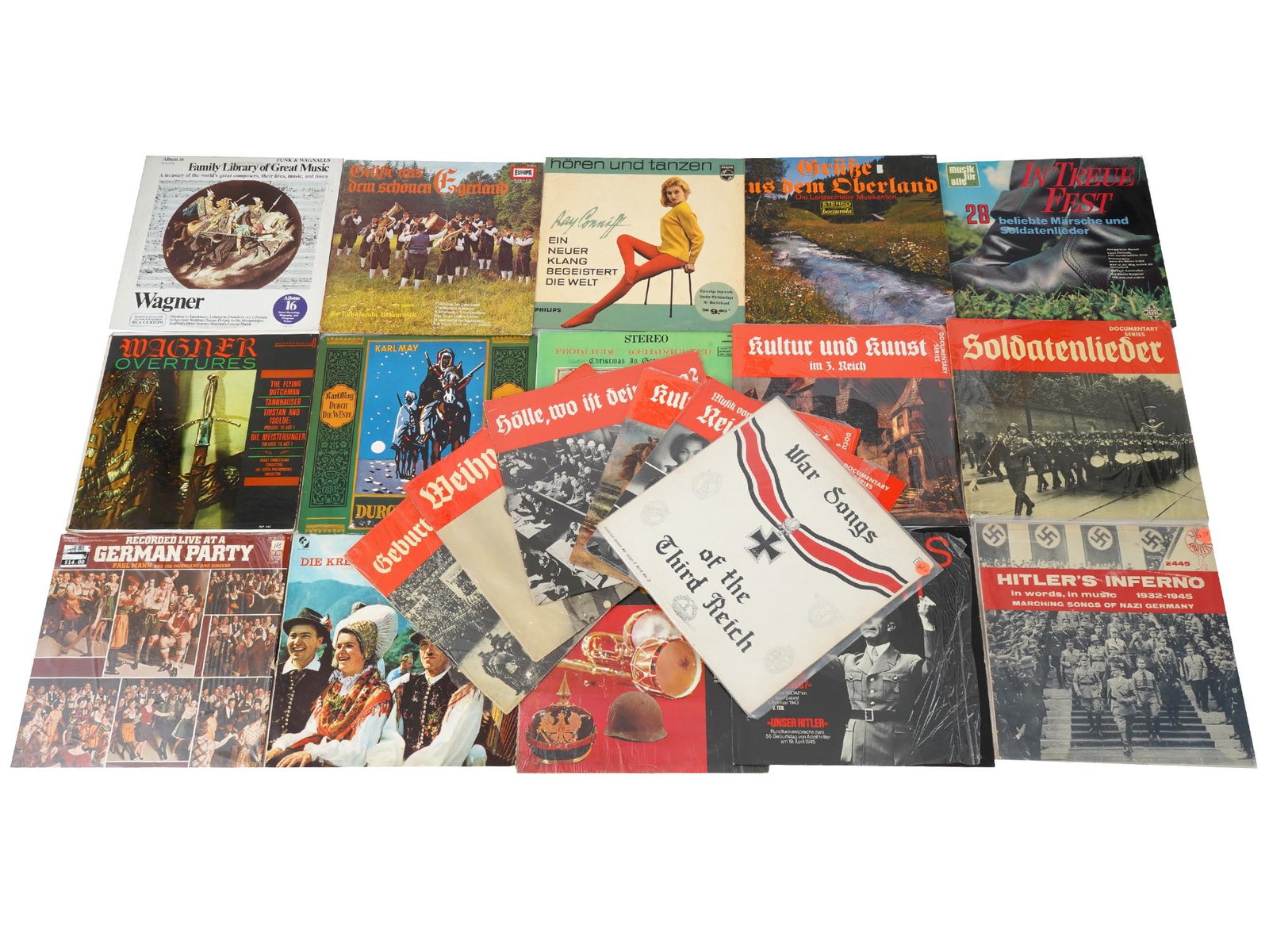 COLLECTION OF 21 WWII NAZI GERMAN LP MUSIC RECORDS: A collection of 21 WWII Nazi German LP music records. The collection includes a variety of musical and documentary recordings from Nazi Germany: Geburstags Parade, War Songs of the Third Reich, Weihna