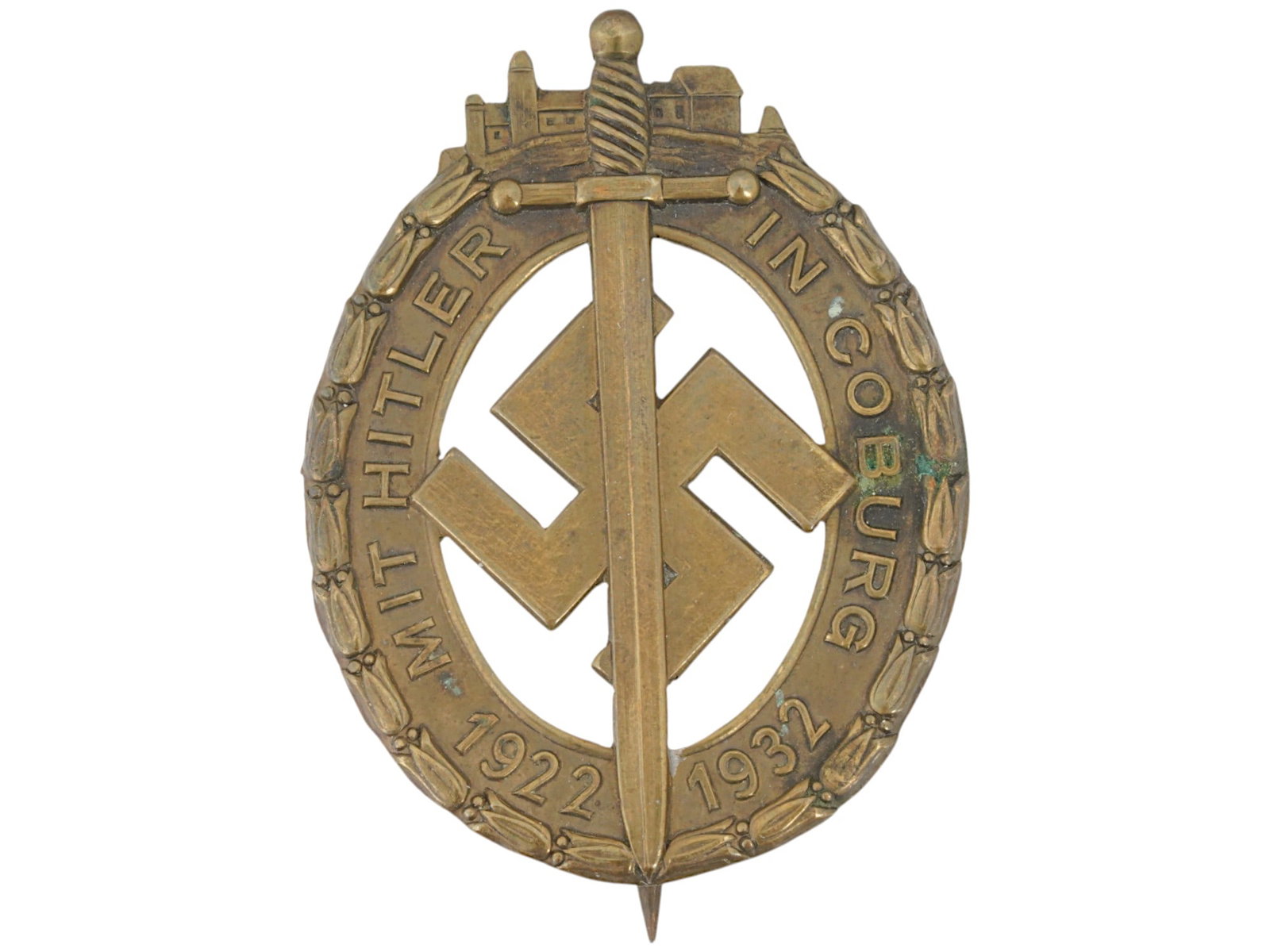WWII GERMAN KOBURGER NSDAP PARTY AWARD BADGE: A WWII German Nazi Koburger Ehrenzeichen NSDAP party award badge, established in 1932. The sign was adopted in memory of the events of the Battle of Coburg in 1922. Features a swastika In the center o