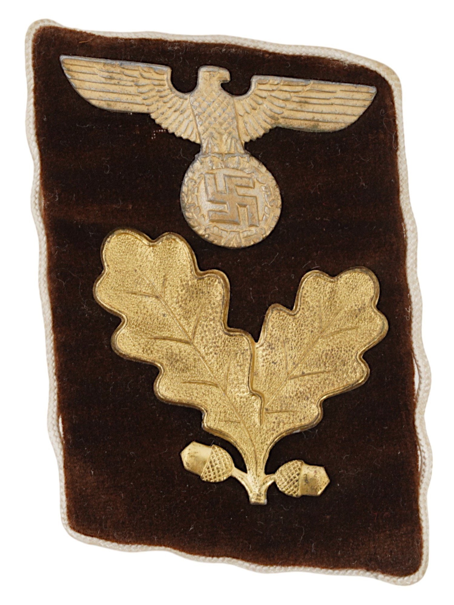 WWII NAZI GERMAN MODEL NSDAP LEADER COLLAR TAB: A Nazi German WWII type NSDAP Ober Abschnittsleiter Section Leader collar rank tab. Brown velvet with gilded eagle, oak leaf, and border, with white silk piping. RZM paper sticker, numbered, on the ba