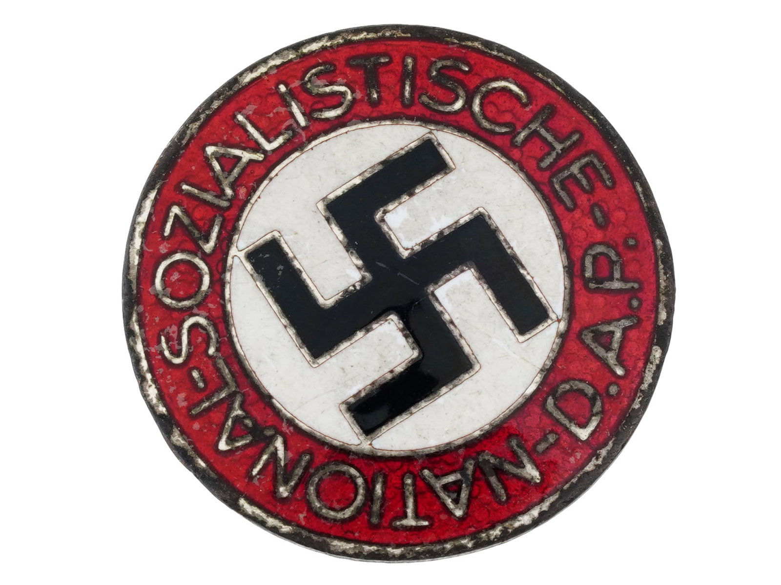 WWII TYPE NAZI GERMAN THIRD REICH NSDAP PARTY BADGE: A WWII model Nazi German Third Reich political NSDAP party badge. The front reads, National Sozialistische D. A. P. The badge is enameled with a swastika insignia in the center. Has a thin horizontal 