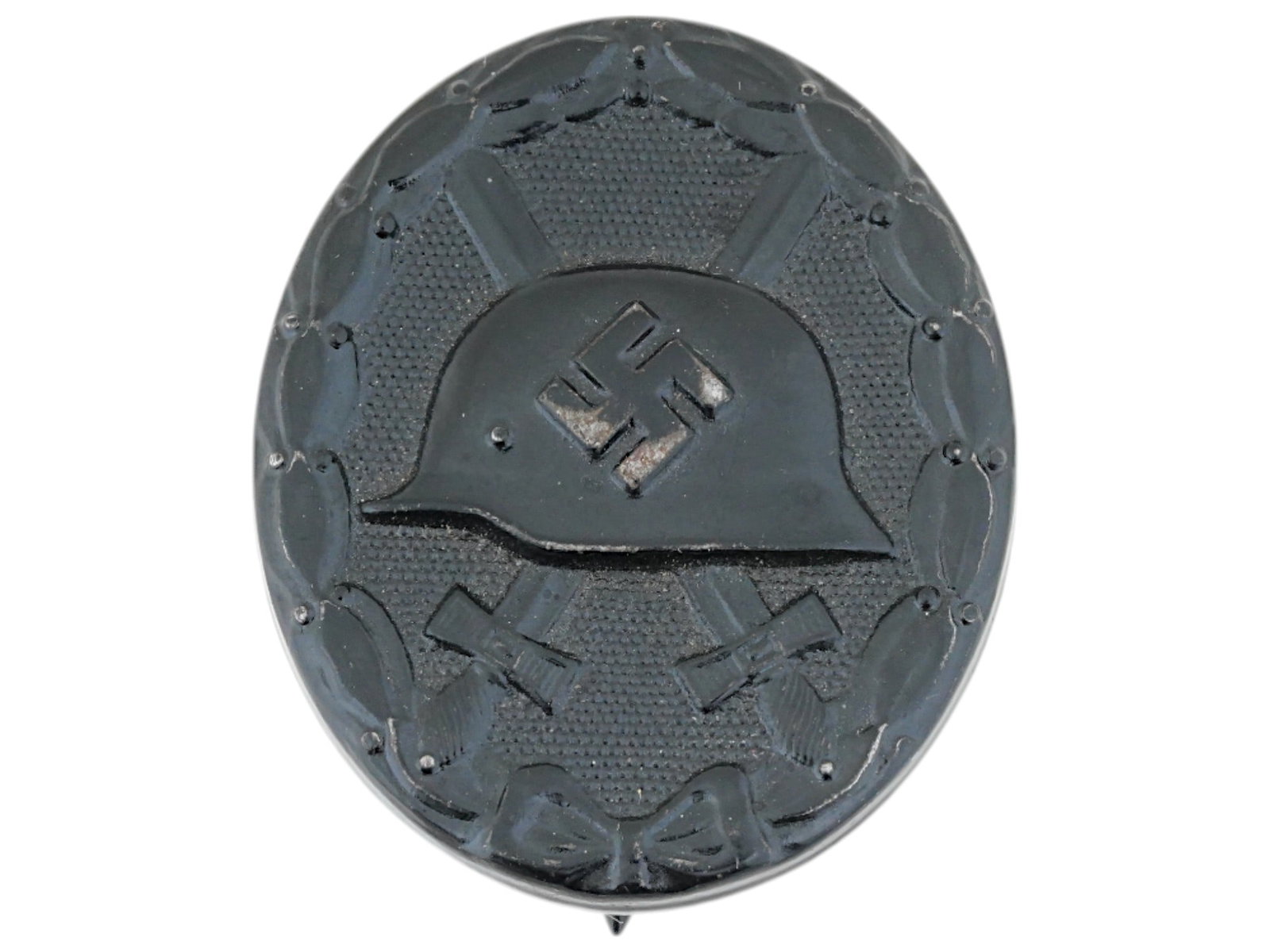 WWII ERA GERMAN NAZI INJURY AWARD BADGE: A WWII era German Nazi third class injury award badge from 1939. It depicts two crossed swords and a helmet with a swastika. Second World War Historical Collectables And Memorabilia, Military Insignia