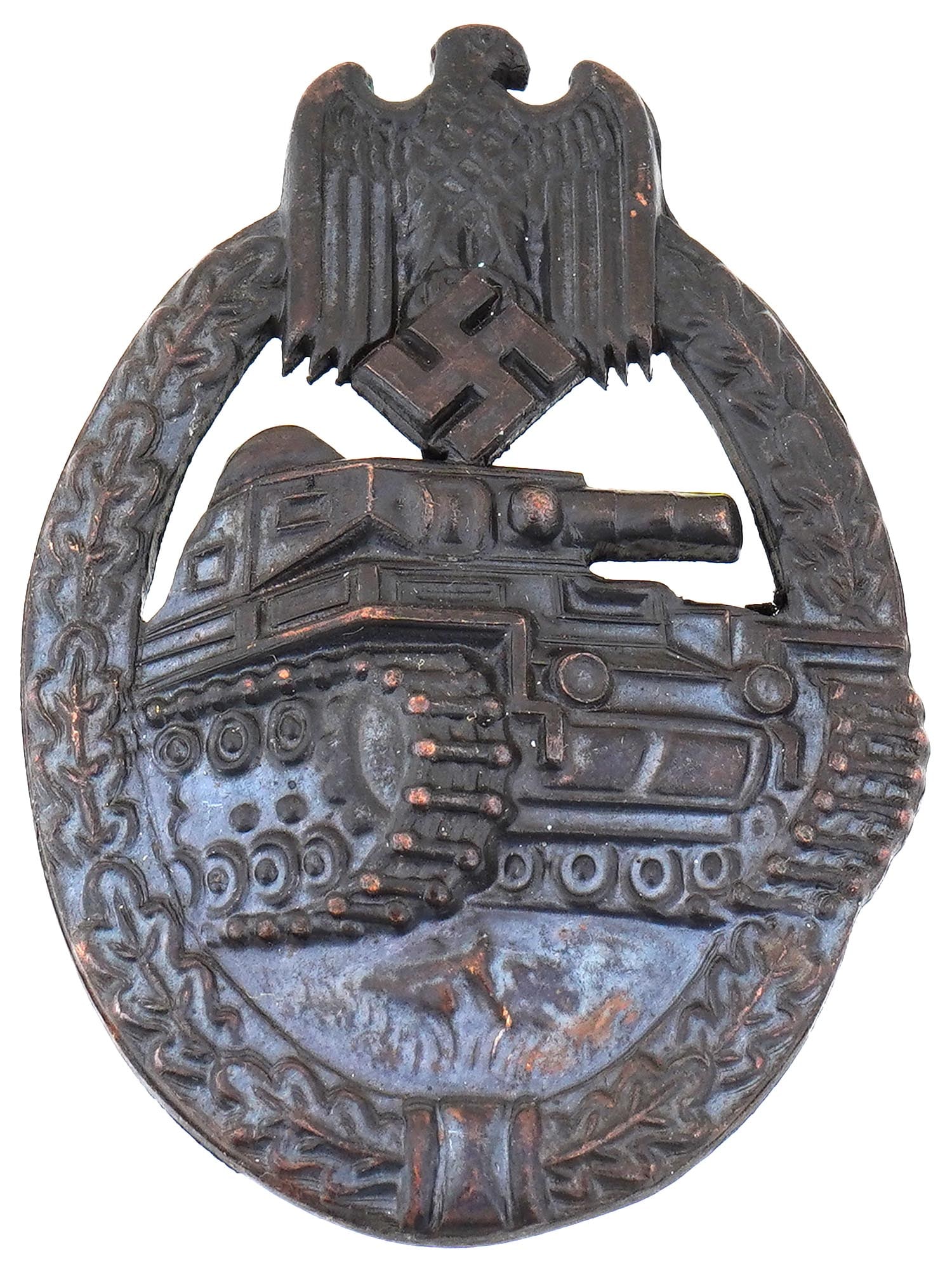 WORLD WAR II NAZI GERMAN THIRD REICH PANZER BADGE: A WWII Nazi German Panzer badge, oval in shape, featuring a three-quarters front image of a Panzer IV tank, surrounded by an oak wreath and surmounted by the Wehrmacht eagle clutching a swastika. Seco