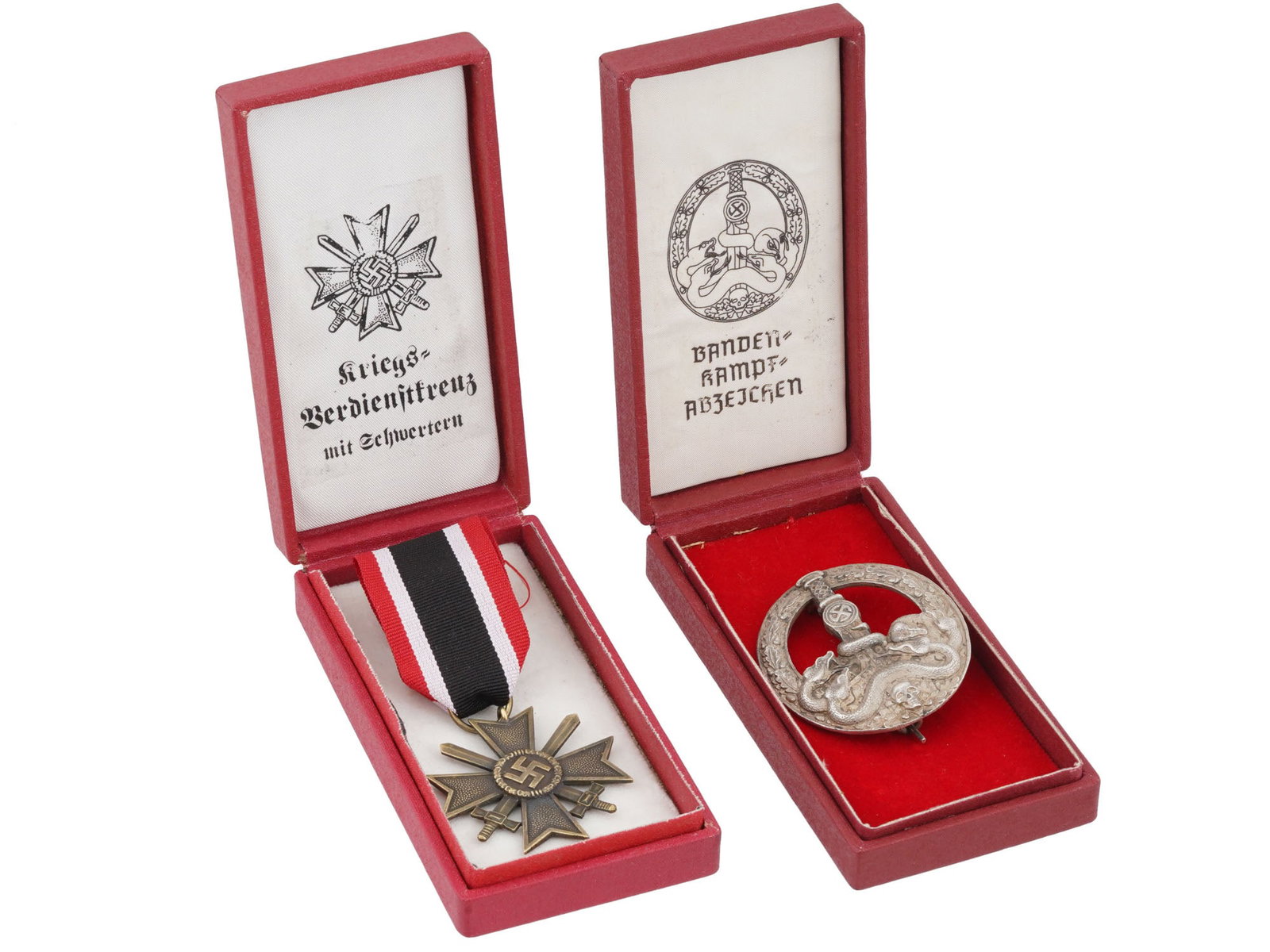 WWII GERMAN WAR MERIT CROSS AND ANTI PARTISAN BADGE: A lot of two WWII type German Third Reich medals in the boxes. First is the War Merit Cross, in German Kriegsverdienstkreuz, which was a state decoration of Nazi Germany during World War II. This awar
