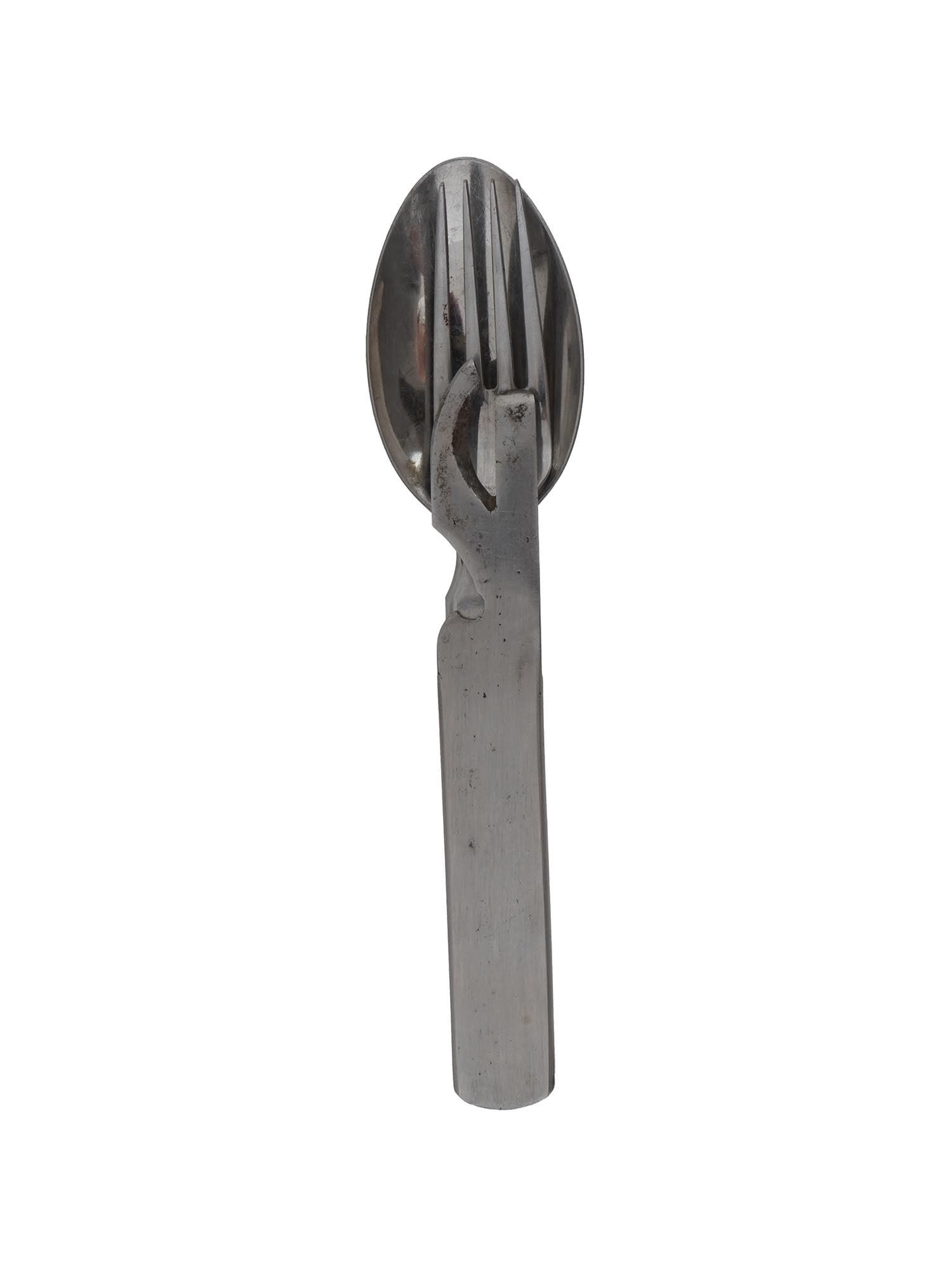WWII GERMAN THIRD REICH FIELD FOLDING CUTLERY SET: A WWII German Third Reich field folding cutlery set. The lot includes a can opener, a spoon, and a fork. All the items in the set, with a simple design without decorations, fit into one section of the