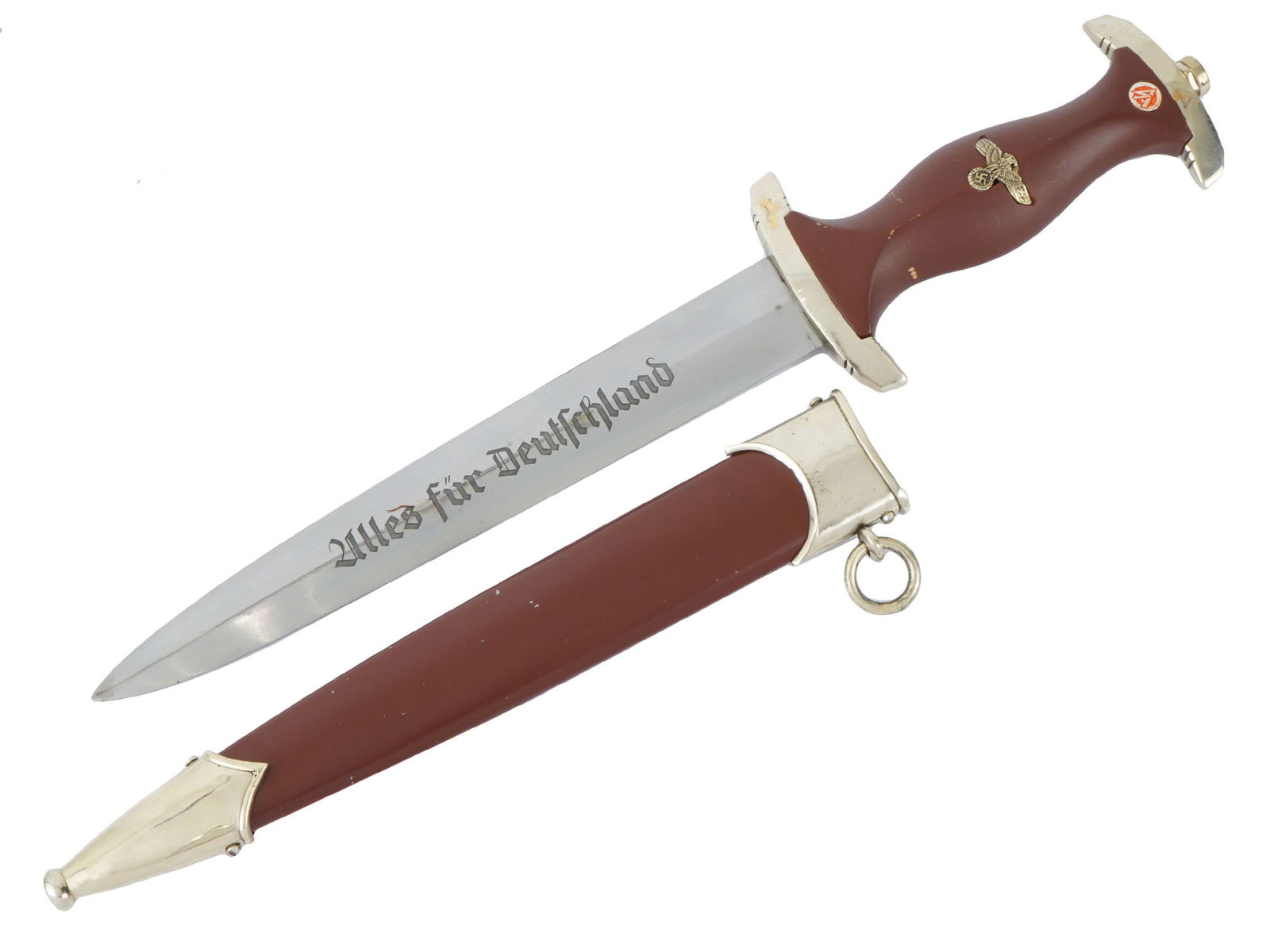 GERMAN WWII SA MODEL DAGGER BY BOKER SOLINGEN: A WWII Nazi German Third Reich period model SA dagger. The double edged steel blade of the dagger is engraved with the motto in German, Alles Fur Deutschland, Everything for Germany. The dagger featur