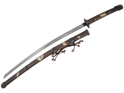 ANTIQUE JAPANESE KATANA W INLAY: An antique Japanese handmade katana sword depicting typical Japanese ornaments. Fully inscribed scabbard with animals and writing. The animals are made of inlayed silver. The tips are mystical animal