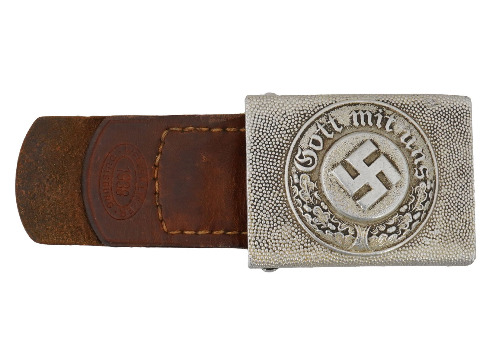 WWII MODEL NAZI GERMAN MILITARY BELT BUCKLE: A World War II type Nazi German aluminum belt buckle with swastika emblem and the motto Gott mit uns, God is with us. 1938 Duisburg leather belt piece is preserved. Second World War Historical Collect