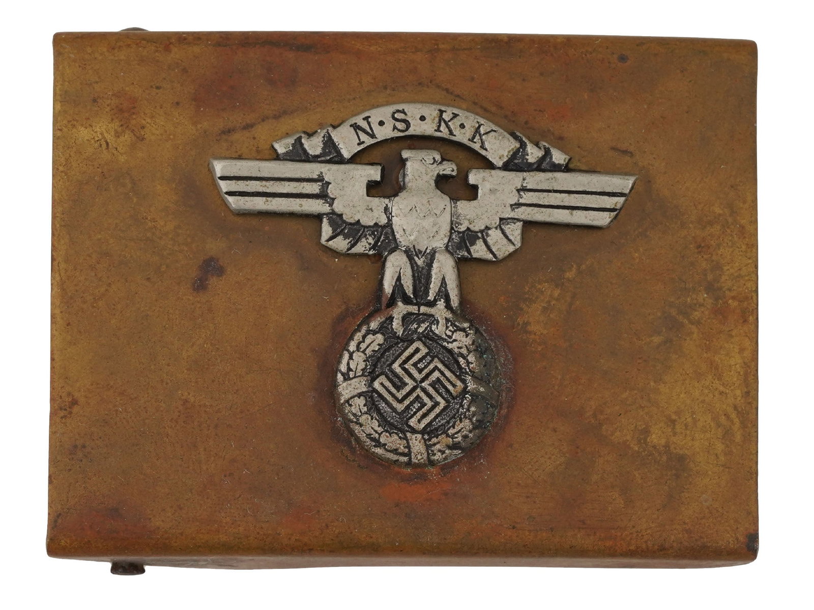 WWII MODEL NAZI GERMAN THIRD REICH NSKK BELT BUCKLE: A World War II type Nazi German NSKK belt buckle. The belt buckle is adorned with a Nazi eagle clutching a swastika insignia, and inscribed, NSKK, upper to the center. NSKK stands for Nationalsozialis