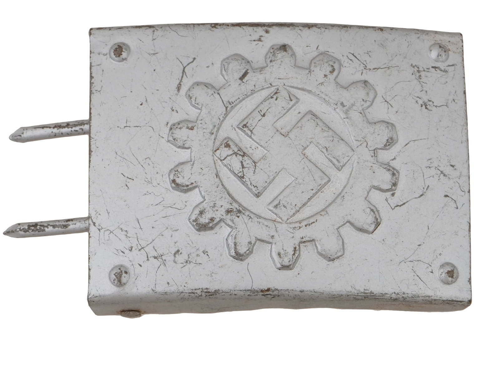 WWII MODEL NAZI GERMAN RAD LABOR FRONT BELT BUCKLE: A World War II model Nazi German RAD Labor Front aluminum belt buckle. The buckle is adorned with an engraved image representing a swastika insignia inside a gear. Marked on the backside. Second World