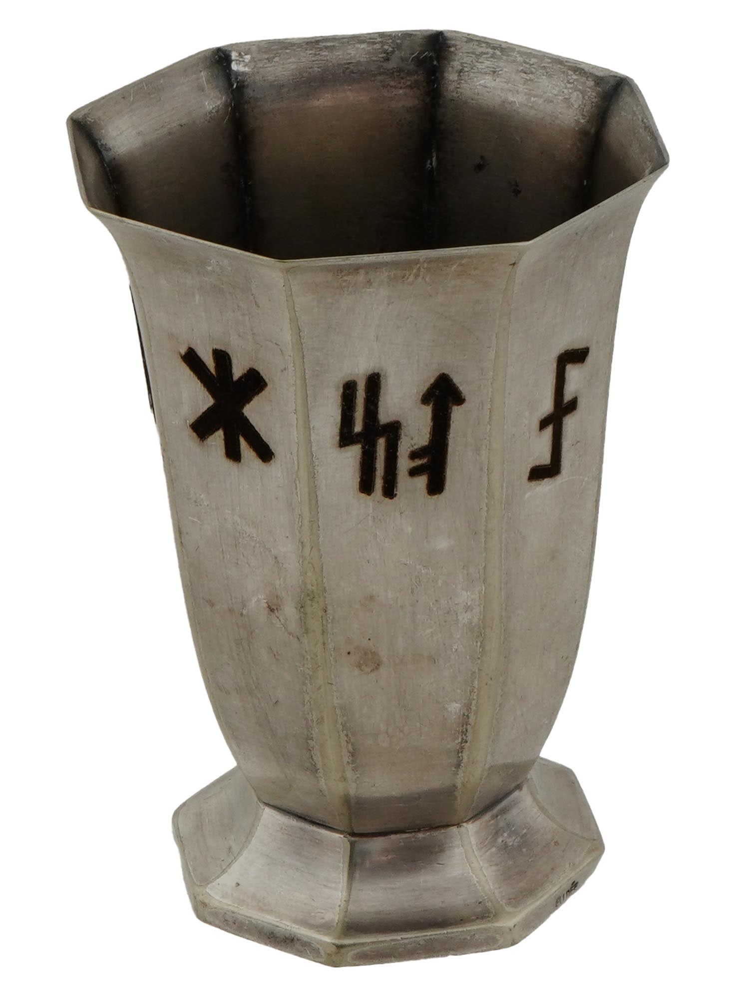 GERMAN WWII TOTENKOPF RUNES SILVER PLATED VASE: A World War II type Nazi German silver plated vase. Faceted piece with figurative rim. Each facet features a niello symbol, Totenkopf and Germanic runes. Marked Bruckmann on the bottom. Second World W