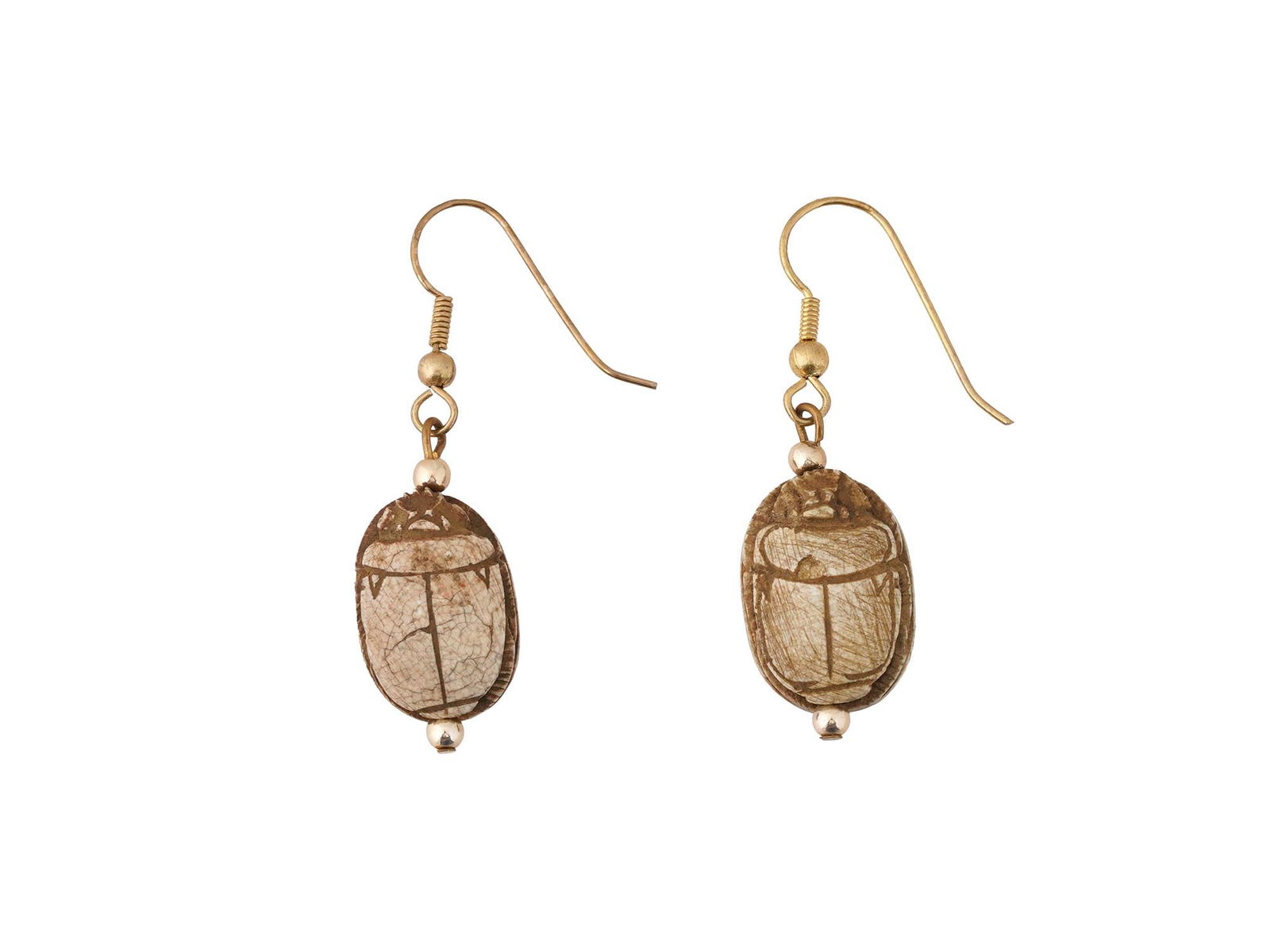 ANCIENT EGYPTIAN LIMESTONE SCARAB SHAPED EARRINGS: An ancient Egyptian scarab shaped earrings hand carved of limestone. Each bears engraved hieroglyphs on the reverse, featuring a symbol of resurrection. Comes with a modern fittings. Museum Pieces, An