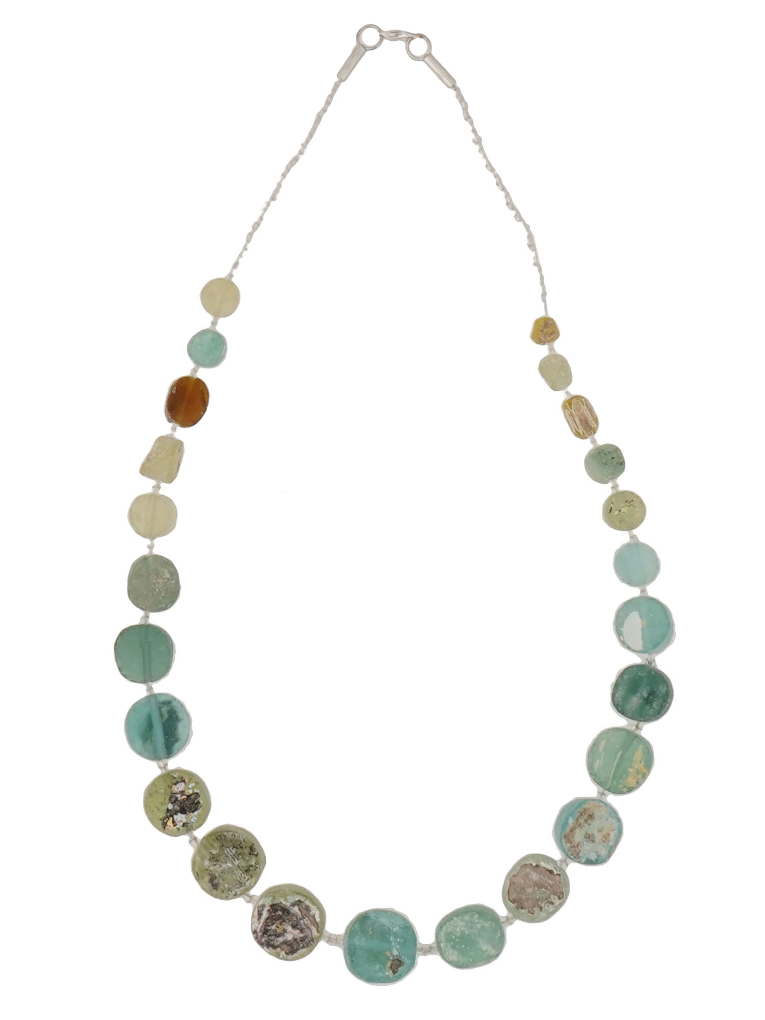 ANCIENT ROMAN GLASS BEAD NECKLACE 100 TO 300 AD: An ancient Roman glass bead necklace, dating from 100 to 300 AD. The necklace is composed of a variety of round shaped glass beads in a range of colors, including greens, blues, yellows, and browns. T