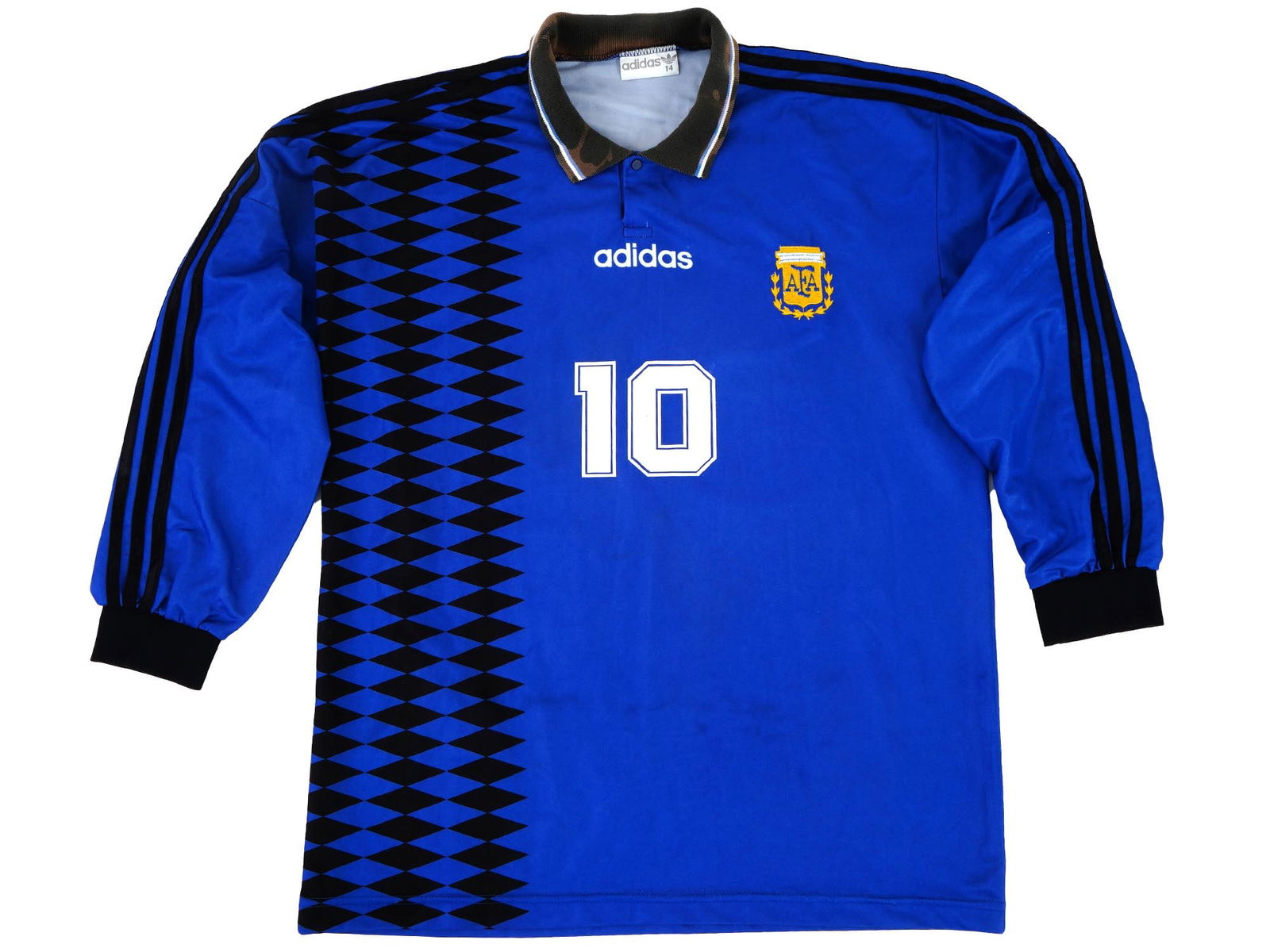 ORIGINAL AMERICAN WORLD CUP ADIDAS MARADONA SHIRT: An original American World Cup Adidas shirt worn by Diego Maradona, Argentine professional football player. Diego Maradona Adidas football shirt is blue with black rhombuses and stripes. The players n