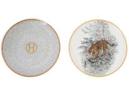 PAIR OF FRENCH PORCELAIN SERVING PLATES BY HERMES: A pair of French porcelain serving plates by Hermes. Mosaique au 24 and Carnets d Equateur collections. The Mosaique au 24 collection was designed by Benoit Pierre Emery. The plate features a white mo